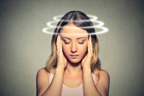 vertigo head pain round round blank in front of eye